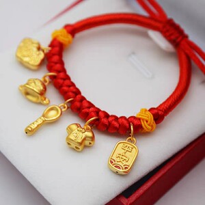 水贝珠宝硬金足金999宝宝儿童金饰锦衣玉食黄金吉祥三宝长命锁