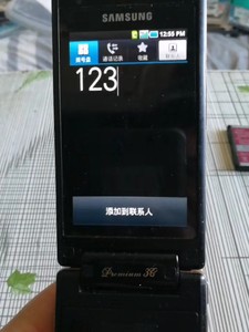 三星W899经典翻盖手机外观良好屏幕贴膜，声音信号正常双卡双