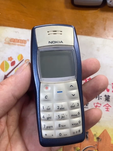 诺基亚1100诺基亚黄屏手机 开机正常 外观还行 看视频 看