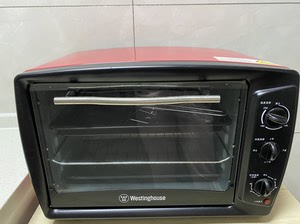 西屋烤箱28l用过两次,几乎全新,送烤盘配件,低价转,限天津