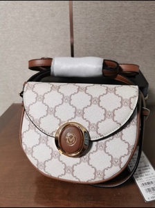 撤柜华伦天奴奥兰迪老花马鞍包女包