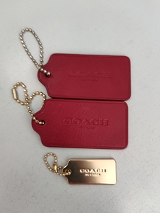 coach吊牌,皮的两个,金属的一个,老公去西班牙出差的时候