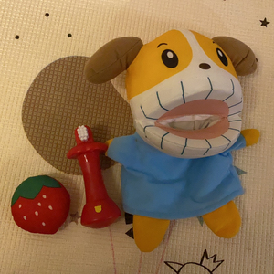 巧虎大嘴狗刷牙手偶9层新.牙刷唱歌有音乐.二手商品不退不换