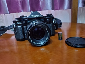 佳能a1胶片机加佳能50mm1.4镜头,镜头红标,成色新,功
