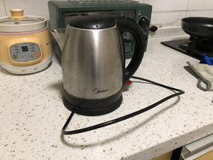 美的正品电水壶烧开水1.2l小容量12s03酒店宾馆家用30
