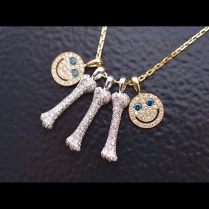 000人付款淘宝eyefunny风格骨头笑脸吊坠925纯银电镀18k