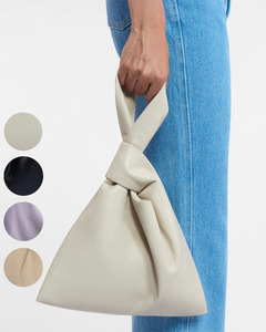 自制蛋白皮系列设计感三角形手腕包粽子包  时尚休闲造型手提包女