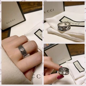gucci/古奇 经典双g互扣925银雏菊镂空雕花男女通用对戒指环