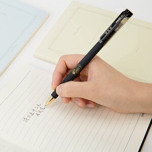 得力36035连中三元中性笔s123考试用碳素笔0.5mm子弹头签字笔