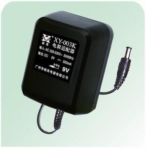 电子秤地磅吊钩秤童车电池用新英直流电源dc9v1000ma 9v1a充电器