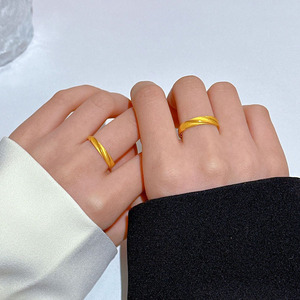 莫比乌斯环黄金情侣戒指男女一对999足金厮守求婚订婚女神节礼物