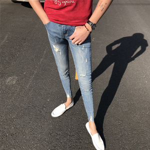 社会精神小伙裤子快手红人网红同款紧身弹力小脚裤毛边牛仔裤男潮