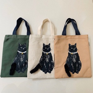 TY25买手店日本 kusuguru 经典立体猫咪手提包两面用ipad收纳女包