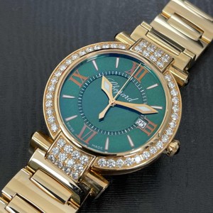 玫瑰金绿面手表