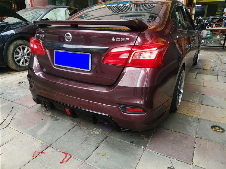 16-19-21款新轩逸改装小包围带灯款领航灯后唇双出排气碳纤维尾翼