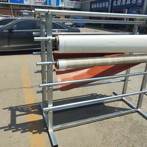 650人付款淘宝新品10卷pvc膜放置架子钢管可移推拉电动吸塑机皮革放料