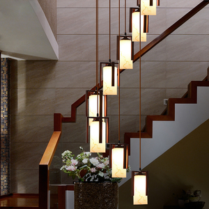 现代新中式楼梯吊灯长吊灯简约别墅复式楼梯间中空红木色挑高吊灯