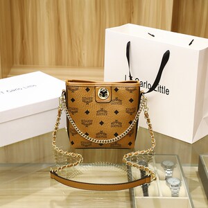 官方旗舰店官网正品mcm包包女真皮单肩斜挎水桶包菜篮子链条女包