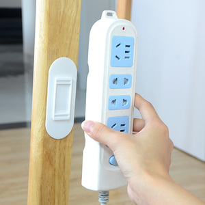 排插固定器墙上贴壁挂强无痕家用免打孔插线板插座挂墙壁粘贴式