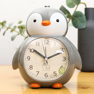 卡通可爱企鹅小闹钟儿童学生专用床头静音夜灯卧室音乐会说话闹钟