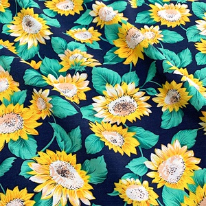 新冰丝人造棉夏凉服n装手料向日葵印花布料柔软垂坠夏天面工衣制