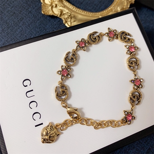 gucci/古驰 2021新款经典双g字母手镯黄铜虎头吊坠手链男女款手环