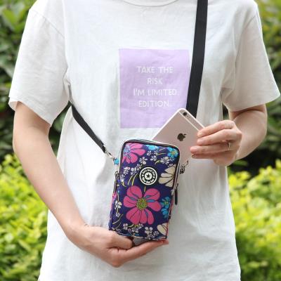 装手机小包夏装手机包手臂包女士便携手腕包夏天零钱包斜挎包夏季