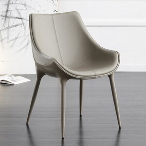 真皮餐椅轻奢高端现代简约家用意式极简网红设计师靠w背北欧歺椅