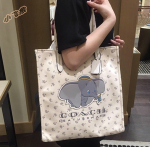 coach/蔻驰女包帆布托特包单肩手提春夏小飞象卡通休闲大号购物袋