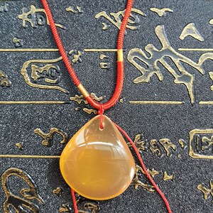 鱼惊石青鱼鱼石青鱼石吊坠青鱼石挂件青鱼石手链青鱼骨石骨色吊坠