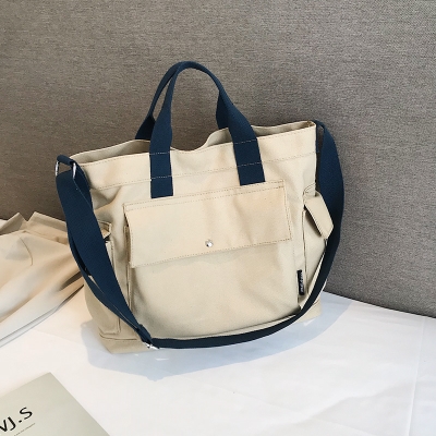 曼易百货店淘宝i包包女2022夏新款大容量手提包韩版b潮帆布撞色单肩