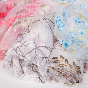 欧根纱布料雪纺印花网纱夏季连衣裙服装面料玻璃纱窗纱飘窗蕾丝布