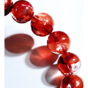 星宿家天然鸩羽幽灵手链女牛血红胶花水晶手串本命年好运