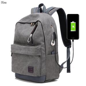 双肩包帆布旅行背包外置usb充电包带耳机孔初高中学生书包