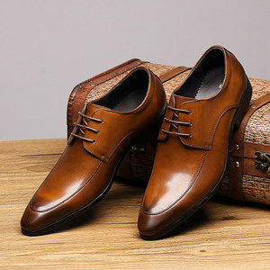 牛皮英伦商务男装皮鞋真皮韩版潮流英俊鞋绑带尖头土黄棕色结婚。