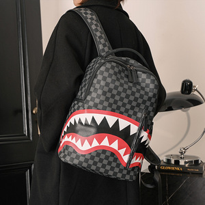 香港代购潮牌鲨鱼嘴牙齿印花双肩背包时尚休闲旅行背包学生书包男