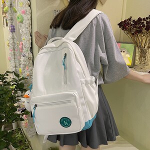 日本アニメバッグ书包女潮牌大容量ins初中生双肩包森系简约背包