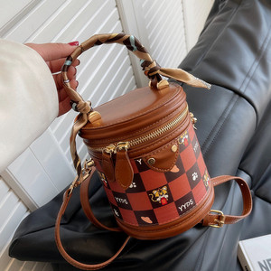 圆筒包包女2022春夏新款百搭圆柱形手提水桶包复古可爱单肩斜挎包