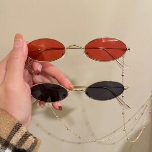 韩国椭圆扁框ins潮流网红眼镜女红色带链条墨镜女小脸百搭太阳镜
