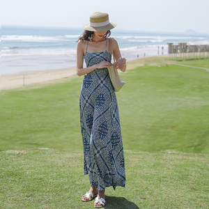 泰国度假露背连衣裙超仙民族风吊带长裙沙滩海边气质蓝色雪纺裙子