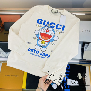 gucci/古驰新款叮当猫印花情侣款圆领卫衣男休闲长袖上衣套头衫女
