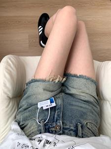 蓝色牛仔短裤女夏季2024新款美式复古热裤小众设计感毛边阔腿裤子