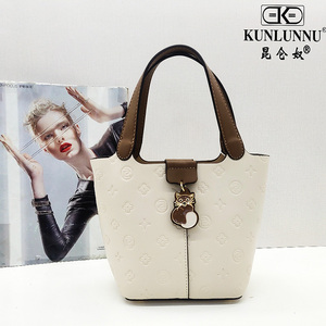 昆仑奴女包正品2022新款时尚潮流1460单肩包1638高级感1503腋下包