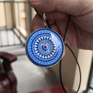 万花筒曼陀罗猫眼灵摆催眠钟摆能量吊坠心理咨询师工具