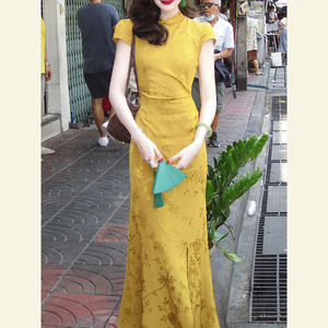 新中式黄色提花旗袍礼服日常可穿气质轻奢小众国风盘扣连衣裙夏季