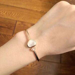 代购chopard萧邦happy hearts玫瑰金珍珠贝母心形手镯857482-5300