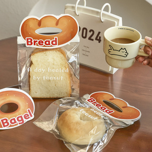 2024新款贝果面包异形卡头饼干包装袋曲奇机封袋装饰卡片烘焙糖果