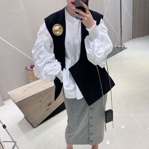 2019春夏 宽松时髦侧面纽扣大v领简约口袋黑色西装马甲开叉女