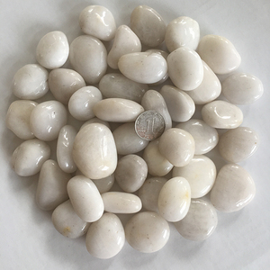 天然白色鹅卵石铺路石黄色雨花石庭院铺地家用黑色鹅软暖石小石头