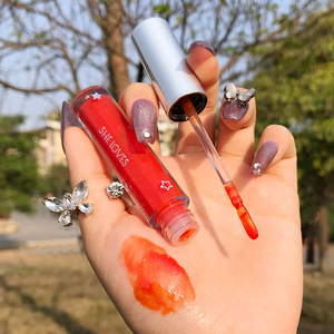 希乐丝sheloves晶动星空水光保湿玻璃唇釉橘子汽水保 口红heloves